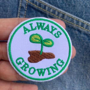 Alltid växande strykmärke, strykmärken broderad applikation