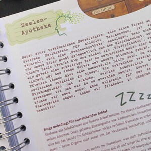 May include: A page from a book titled "Seelen-Apotheke" with a green and brown illustration of a tree and a person's head. The text on the page discusses the importance of sleep and how to create a relaxing sleep environment. The text also mentions the benefits of using plants to improve mood and well-being.