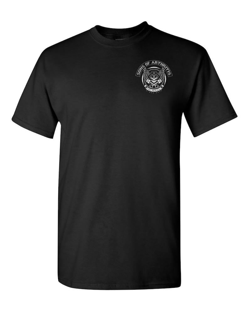 May include: Black t-shirt with a white graphic of a skull with wings and the text "Sons of Arthritis The Originals".