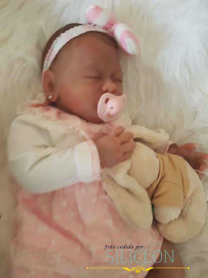 reborn dolls with their eyes closed