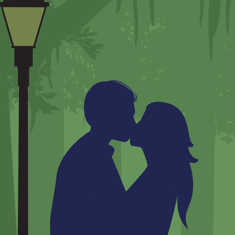 May include: Silhouette of a couple kissing in front of a green leafy background with a street lamp to the left.
