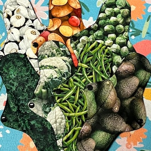 May include: A collection of five reusable cloth pads featuring various food prints. The patterns include white garlic bulbs, sliced potatoes, green brussels sprouts, cauliflower florets, green beans, and dark green avocados, each with black snap fasteners.