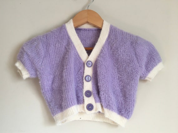 purple shrug sweater
