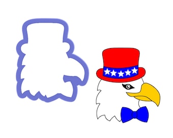 Può includere: Un design patriottico con la testa di un'aquila dei cartoni animati che indossa un cappello a cilindro rosso, bianco e blu e un papillon blu. Accanto all'aquila c'è un tagliabiscotti abbinato.