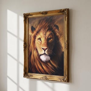 May include: A framed portrait of a lion. The lion's face is the focal point, with a detailed depiction of its fur and features. The frame is ornate, with a gold finish and decorative detailing.