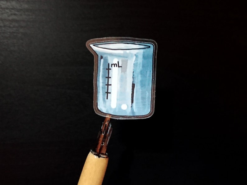 May include: A blue glass beaker with a white ml measurement scale. The beaker is a sticker on a black background.