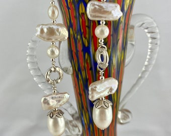 Brilliant White Pearl Earrings. Silver and mixed Pearl dangle and drop statement.