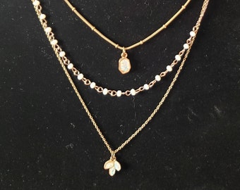 Gold Toned 4 strand white beaded moonstone necklace multi layered