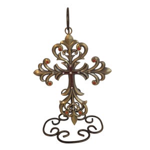 Silver-toned cross on a stand with Clear and red rhinestones