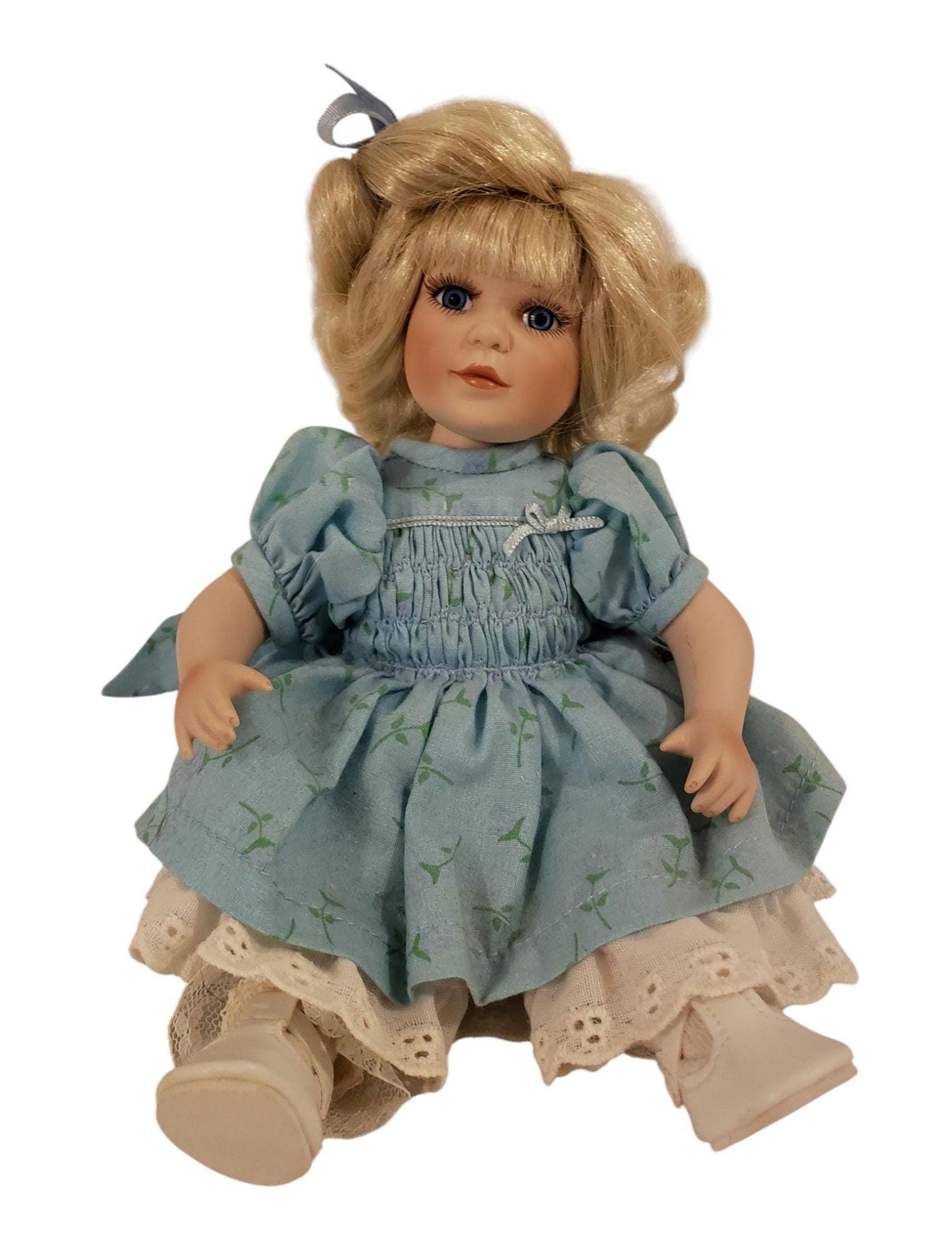 Marie Osmond kleine Porzellanpuppe Blonde Haare blaues Kleid