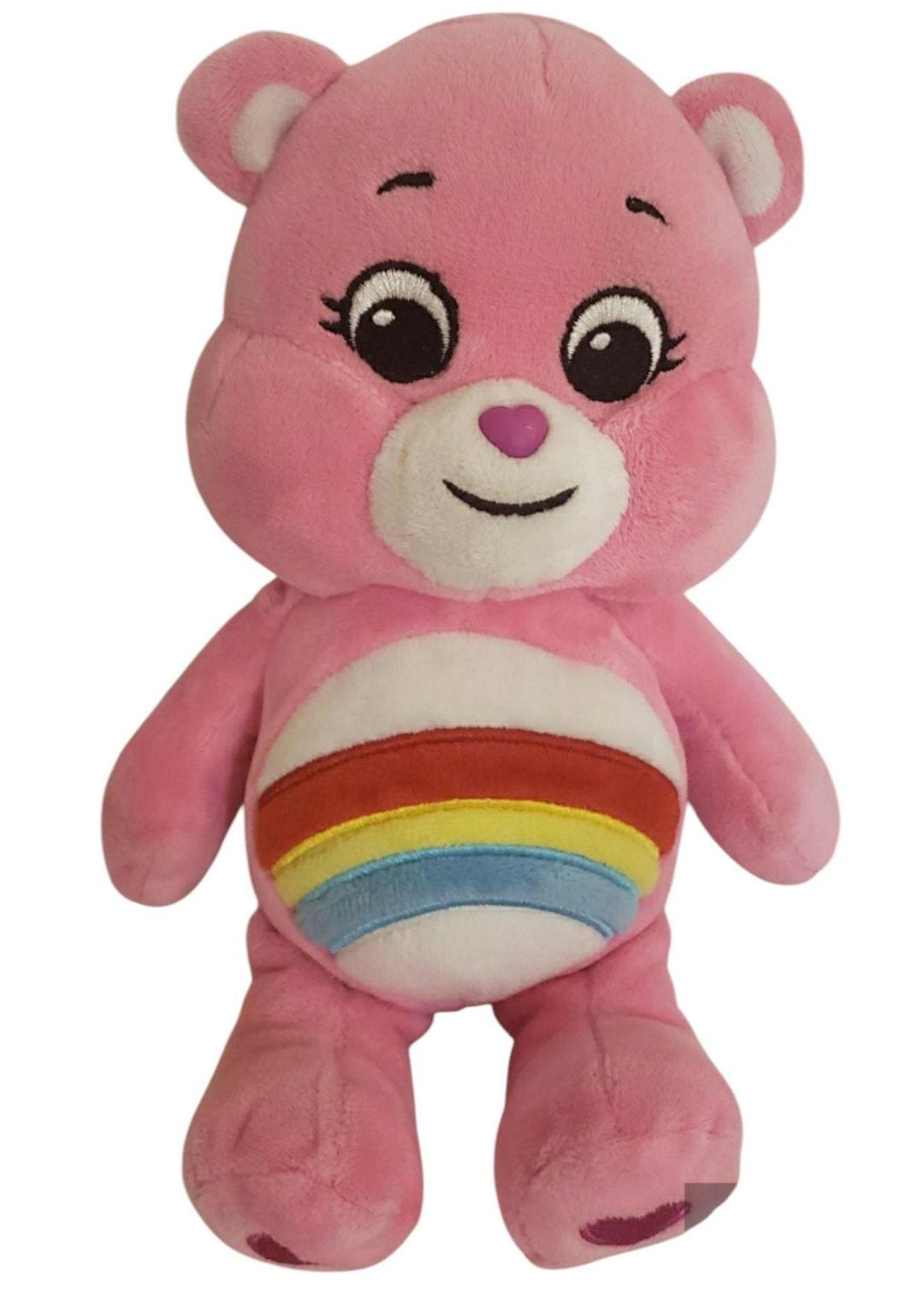 Oso de peluche rosa con barriga arcoíris de los Ositos Cariñositos