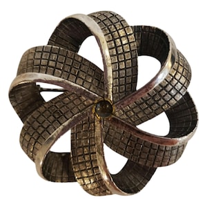Silver toned Pinwheel Brooch pin
