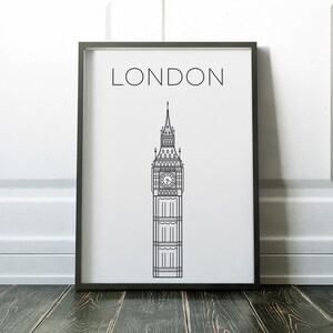 May include: Black and white line art print of Big Ben, a famous landmark in London, England. The print is framed in a black frame and has the word "LONDON" printed at the top.