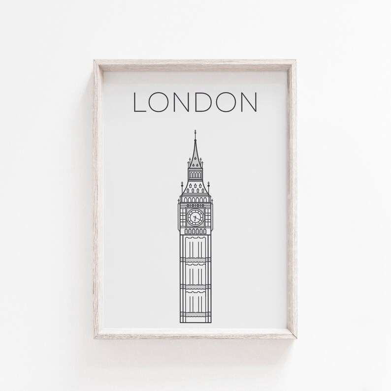 May include: A black and white line drawing of Big Ben, a famous landmark in London, England. The drawing is framed in a light wood frame and the word "LONDON" is printed above the image.