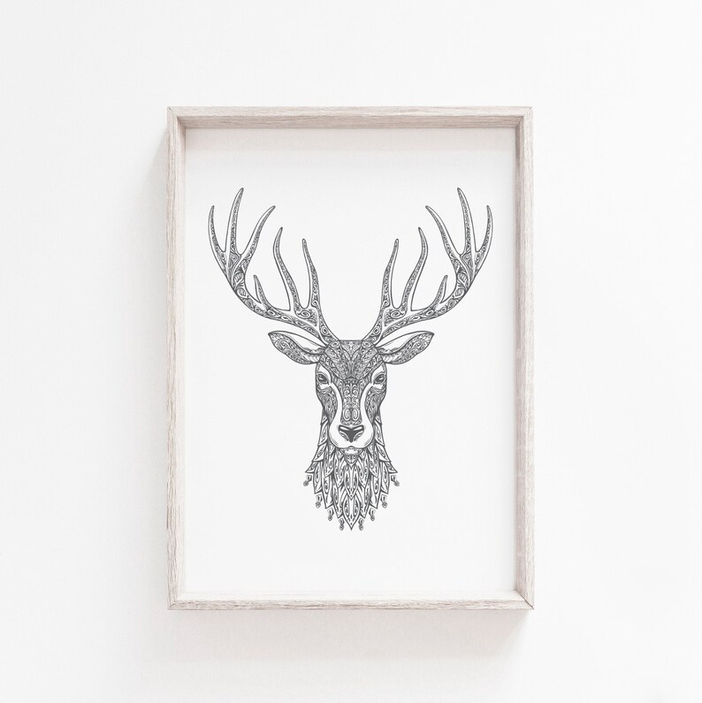 May include: A black and white line art print of a deer's head with intricate patterns in the antlers and fur. The deer is looking directly at the viewer.