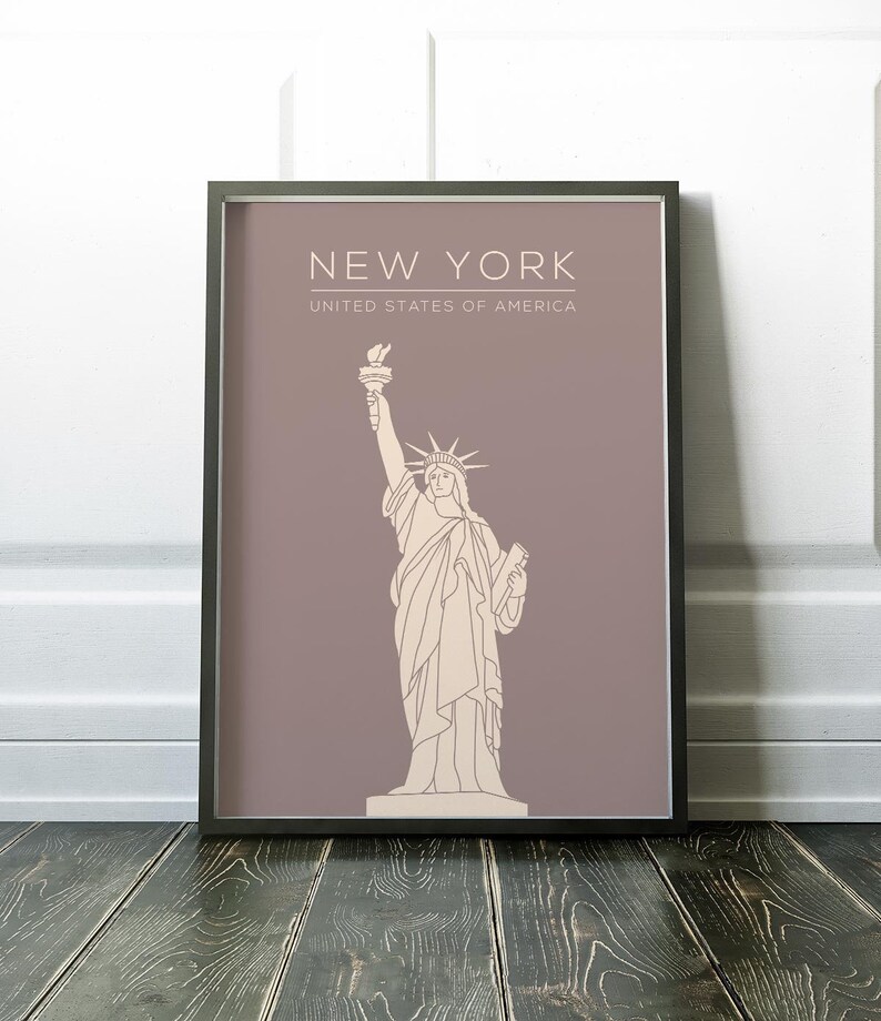 May include: A printable poster with a minimalist line drawing of the Statue of Liberty on a light purple background. The text "NEW YORK" and "UNITED STATES OF AMERICA" is printed in white at the top of the poster.