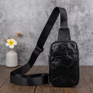 Sac à bandoulière en cuir noir Sac de voyage en cuir véritable Sac de voyage pour homme Sac de poitrine décontracté Sac à bandoulière d'extérieur Cadeaux pour père