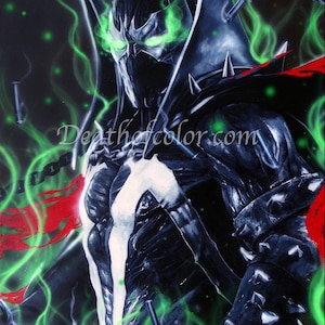 May include: A black and white illustration of a superhero character with glowing green eyes. The character is surrounded by green flames and chains. The text "Deaththecolor.com" is visible in the image.