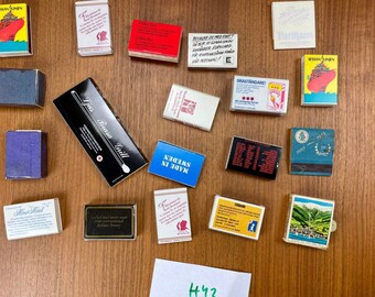 Vintage collection of different matchboxes, some are used and some are not used.