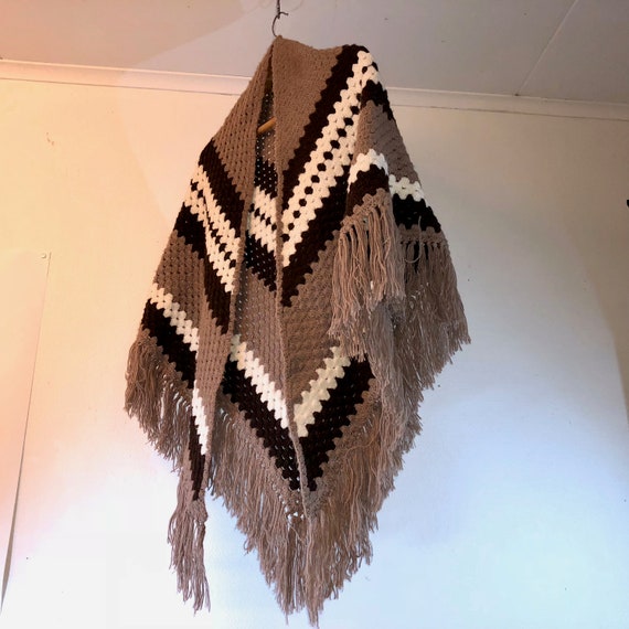 Retro knitted poncho from 1970s