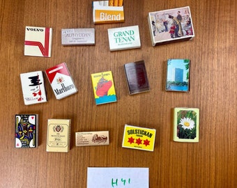 Vintage collection of different matchboxes, some are used and some are not used.