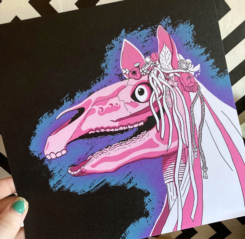 May include: A pink and white skeletal horse head with a floral crown and a long white veil. The horse head is against a dark blue and purple background.