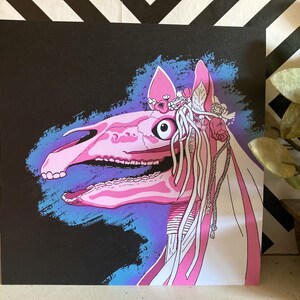 May include: A pink and white horse skull with a floral crown and a veil. The skull is set against a dark blue and purple background.