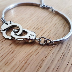 Handschellen Armband: Symbolische Handschellen aus Titanlegierung