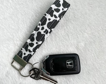Llavero de tela con estampado de vaca: cordón acolchado para llavero