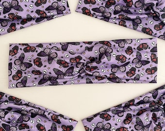 Spooky Purple Butterfly and Skulls Twist Headband: Stretchy Knotted Turban