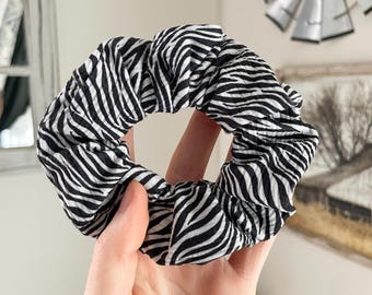 Coletero con estampado de cebra, elástico para el pelo, accesorio para el pelo duradero y sin bultos.