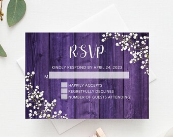 May include: Purple woodgrain RSVP card with white flowers and the text "RSVP" and "KINDLY RESPOND BY APRIL 24, 2023".