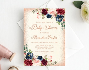 May include: A blush pink and gold baby shower invitation with a floral design featuring burgundy and navy blue flowers. The text reads "Please join us for a Baby Shower honoring Amanda Parker Saturday, January 26, 2019 at 2PM The Smith Residence 123 Washington Street Jackson, MS 39212 RSVP to Megan at 335-123-123 by 05/12"