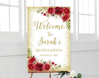 May include: A welcome sign for Sarah's Quinceañera, featuring gold glitter accents and burgundy floral arrangements. The sign is displayed on a wooden easel and includes the date October 16, 2022.