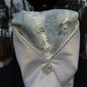 Pre-tied stock tie with ice blue insert w silver braid