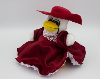 Scarlett Stuffed Penguin in a Red Dress and a Hat with Christmas outfit