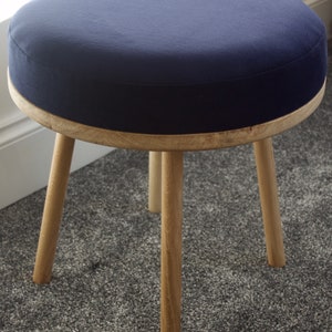 Handmade round solid Oak footstool with straight turned legs upholstered in a recycled velvet that is PFC Free and REACH compliant fabric