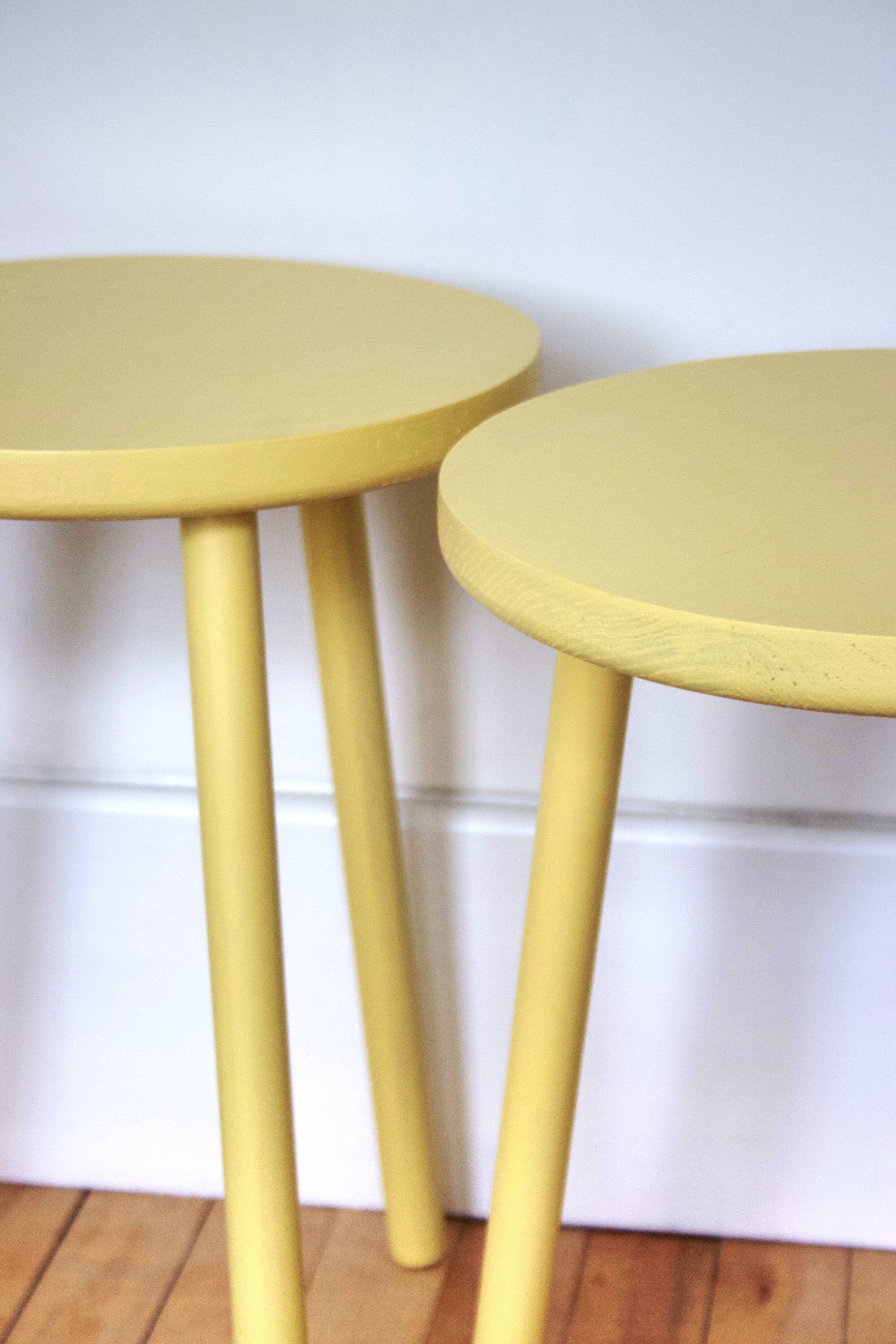 Hand painted round solid European Oak side table with three straight turned legs that are wedge tenon into position painted in F&B eggshell