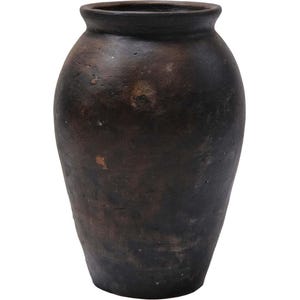 May include: A dark brown, antique-style vase with a wide body and a narrow neck. The vase has a textured surface and a rustic appearance, suggesting it is made of clay or a similar material. The overall shape is reminiscent of a traditional urn or storage vessel.