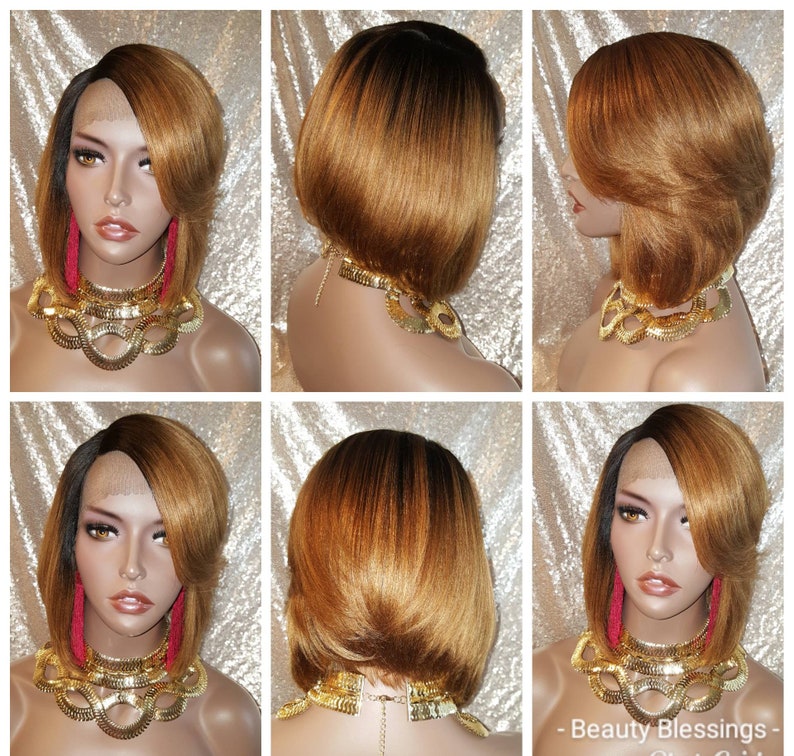 Op de afbeelding: Een kort, recht bob-pruik met een scheiding aan de zijkant en een ombre kleur van donkerbruin naar lichtbruin. De pruik is gestyled met een lichte flip aan de uiteinden. De pruik wordt gedragen door een mannequin met een gouden ketting.