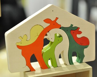 giraffes family CTO play and decorate in suspension