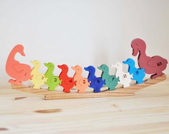 Wooden puzzle, family duck to learn to count