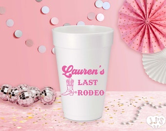 May include: White foam cup with pink text that reads "Lauren's Last Rodeo" and a pink cowboy boot graphic.