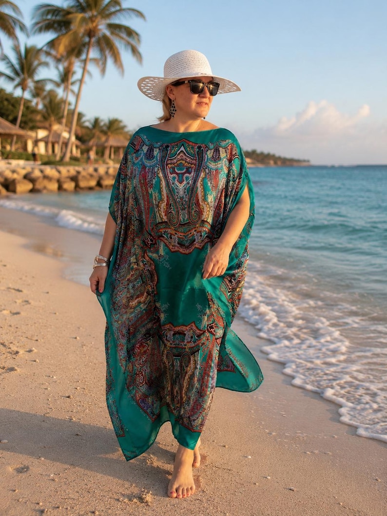 Flowing aquamarine silk georgette kaftan on the beach, designer paisley maxi kaftan dress for resort wear, cruise holidays and summer vacations.