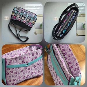 May include: A crossbody bag featuring a black exterior with a colorful floral pattern on the flap and a purple interior lining with a lava lamp print. The bag includes a silver zipper closure, a black adjustable strap, and teal trim accents.