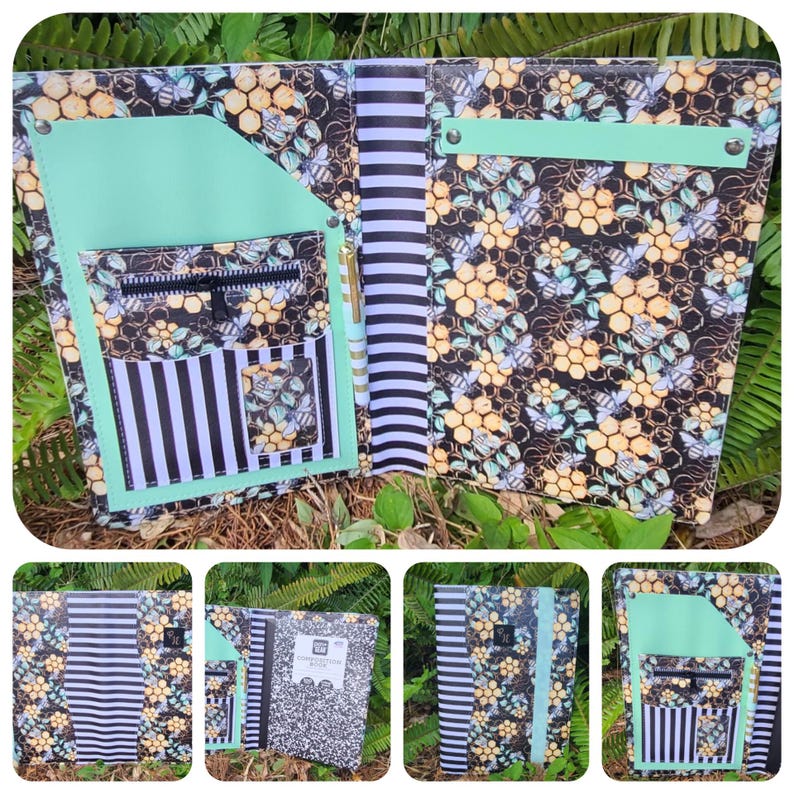 May include: A black and white striped notebook cover with a bee and honeycomb pattern. The cover has a mint green pocket and accents, with a zippered pocket and pen holder. The notebook is open, revealing a black and white striped spine.