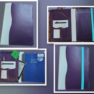 May include: A purple leather portfolio with a white accent and a teal elastic band. The interior features pockets, a zipper pocket, and a pen holder. A blue notebook and a tablet are visible inside.