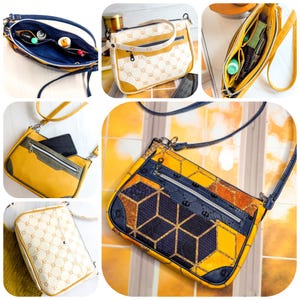 May include: A multi-compartment crossbody bag featuring a yellow and navy blue geometric pattern with a textured finish. The bag includes an adjustable strap, external zippered pockets, and a spacious interior lined with dark blue fabric.