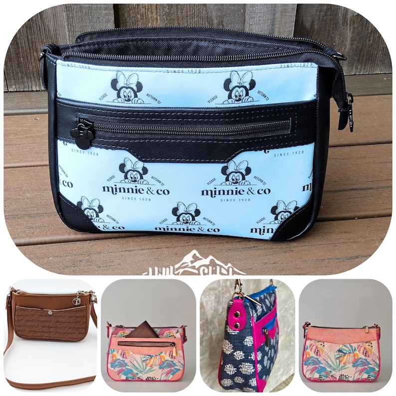 May include: A light blue crossbody bag featuring a repeating black Minnie Mouse pattern and the text "minnie & co since 1928". The bag has a black zippered front pocket with a Mickey-shaped pull, black trim, and a top zipper closure.