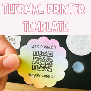 May include: A close-up of a thermal printer sticker template with a rainbow gradient background. The sticker features a QR code and the text "Let's Connect!" and "@joyinmyartco".